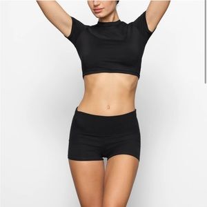 Skims cover up fold over short. XS. Onyx. New with tags. Still in bag